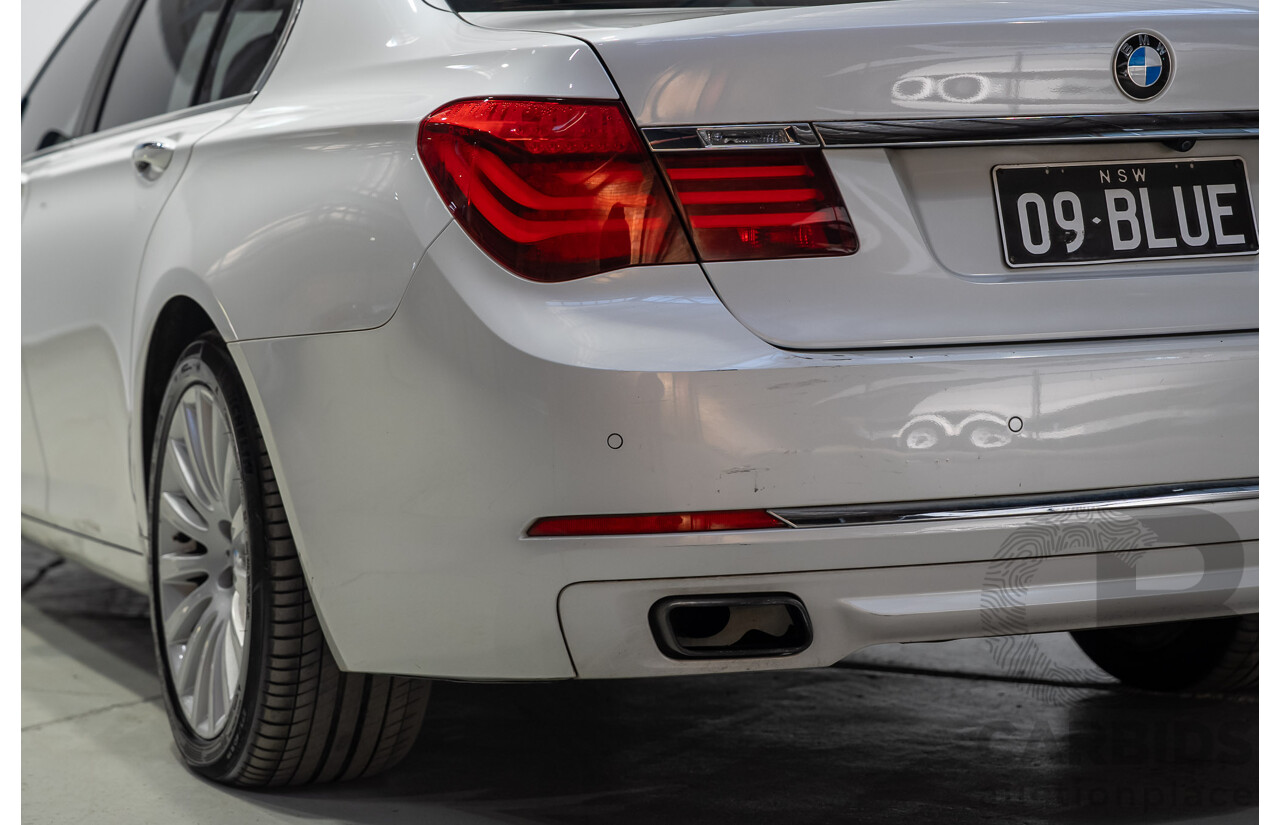 09/2013 BMW 740i F01 MY14 4d Sedan Mineral White Metallic Turbo 3.0L