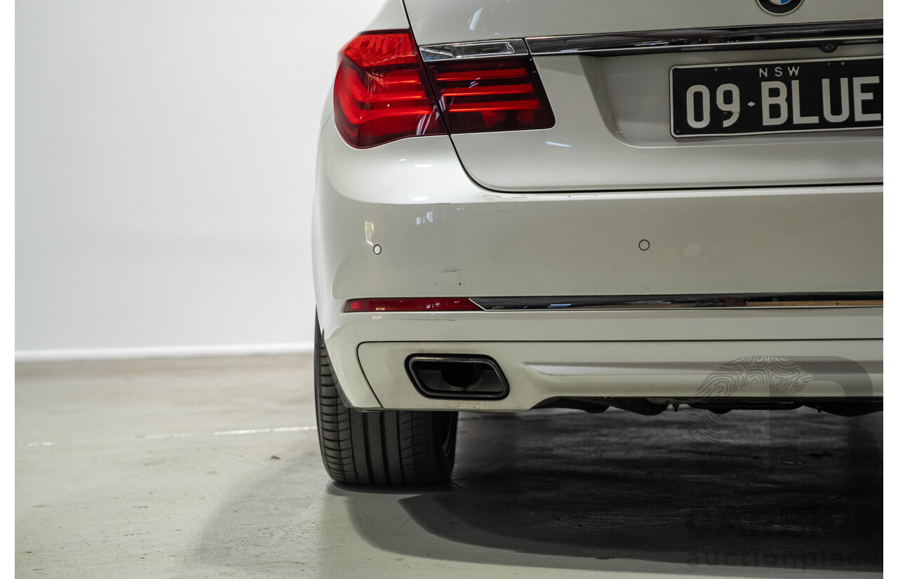 09/2013 BMW 740i F01 MY14 4d Sedan Mineral White Metallic Turbo 3.0L