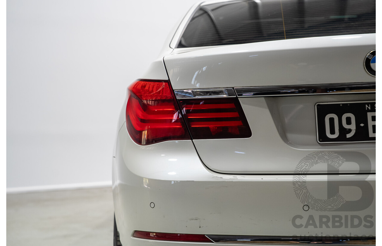09/2013 BMW 740i F01 MY14 4d Sedan Mineral White Metallic Turbo 3.0L