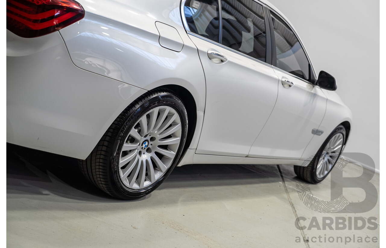 09/2013 BMW 740i F01 MY14 4d Sedan Mineral White Metallic Turbo 3.0L