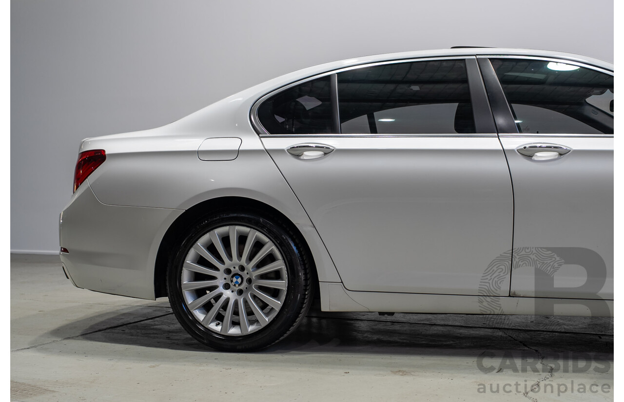 09/2013 BMW 740i F01 MY14 4d Sedan Mineral White Metallic Turbo 3.0L