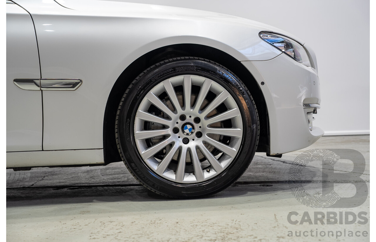 09/2013 BMW 740i F01 MY14 4d Sedan Mineral White Metallic Turbo 3.0L