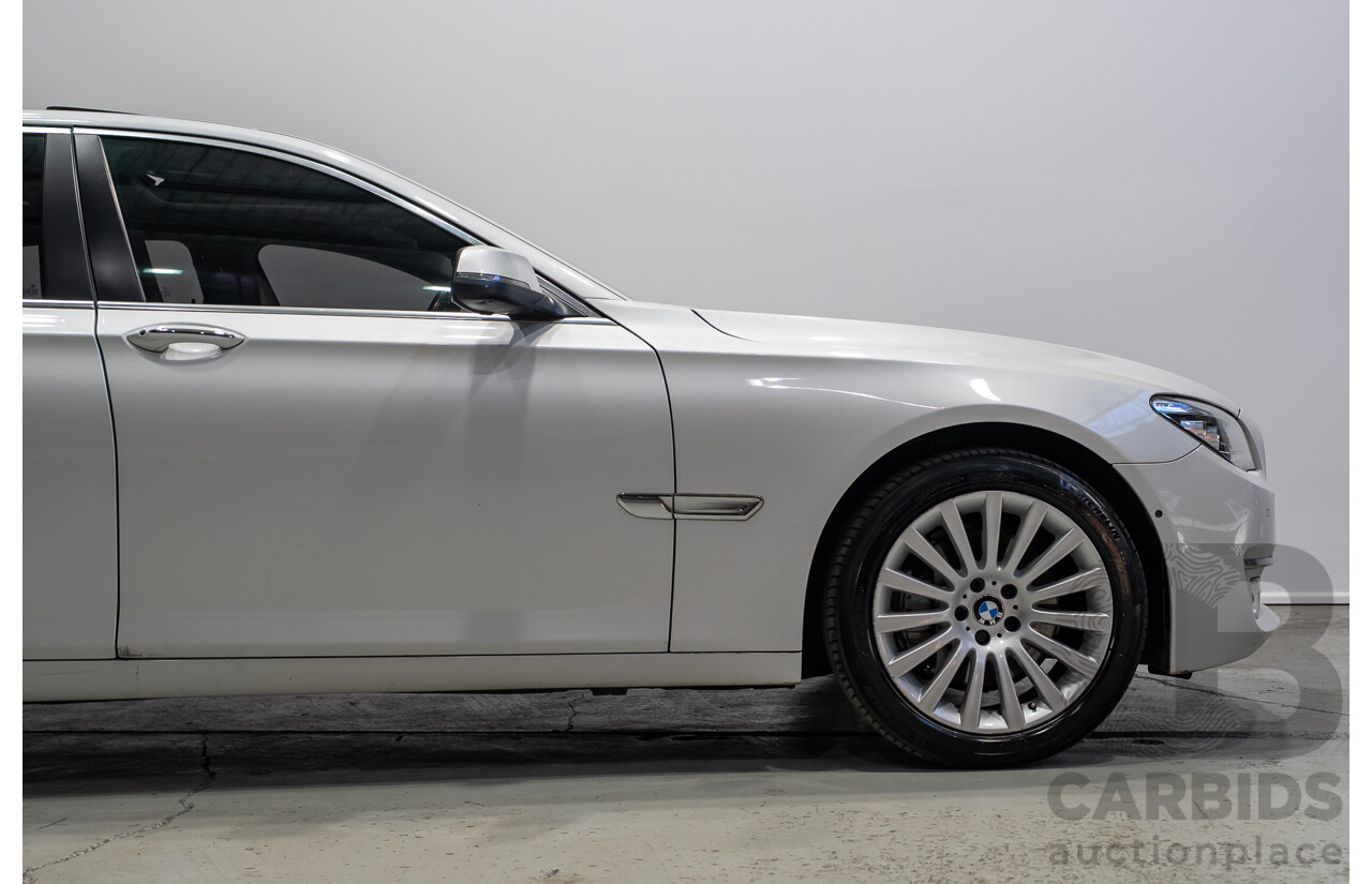 09/2013 BMW 740i F01 MY14 4d Sedan Mineral White Metallic Turbo 3.0L