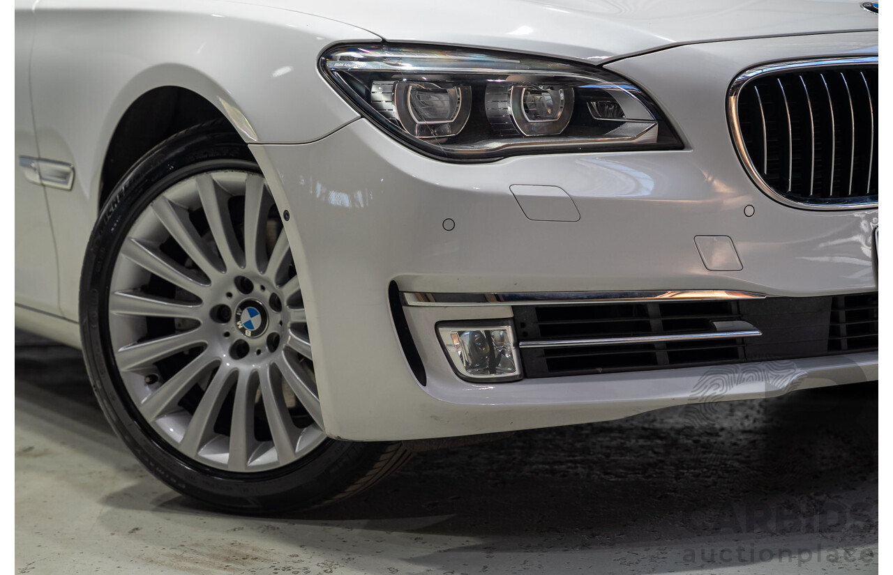09/2013 BMW 740i F01 MY14 4d Sedan Mineral White Metallic Turbo 3.0L