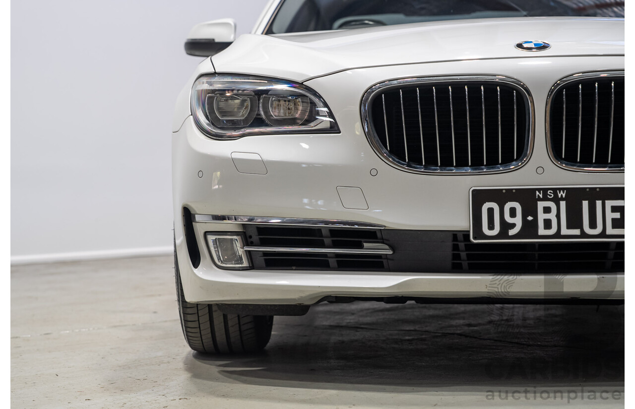 09/2013 BMW 740i F01 MY14 4d Sedan Mineral White Metallic Turbo 3.0L
