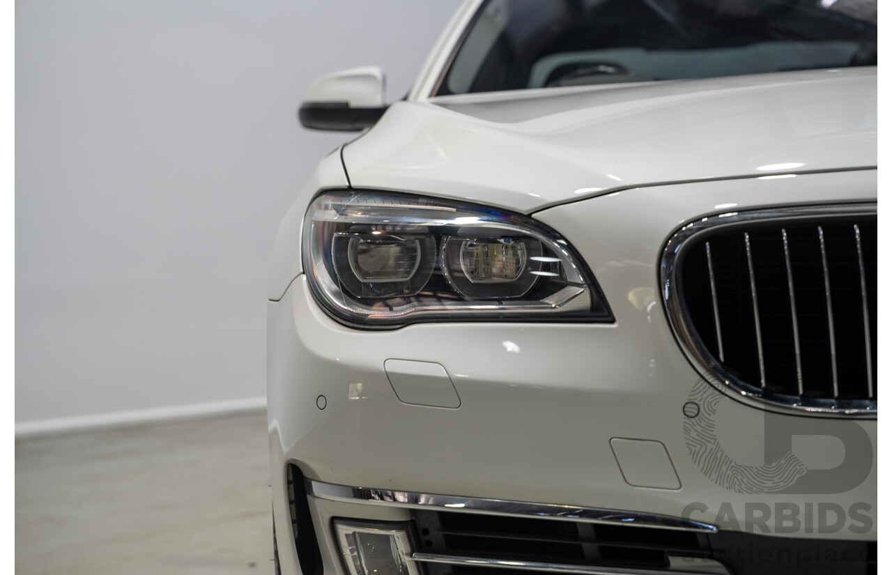 09/2013 BMW 740i F01 MY14 4d Sedan Mineral White Metallic Turbo 3.0L