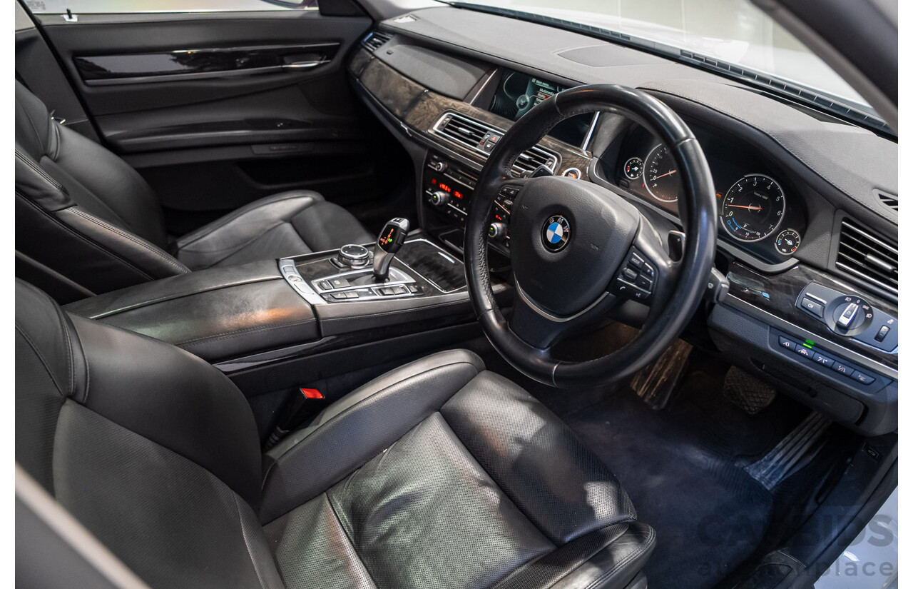 09/2013 BMW 740i F01 MY14 4d Sedan Mineral White Metallic Turbo 3.0L