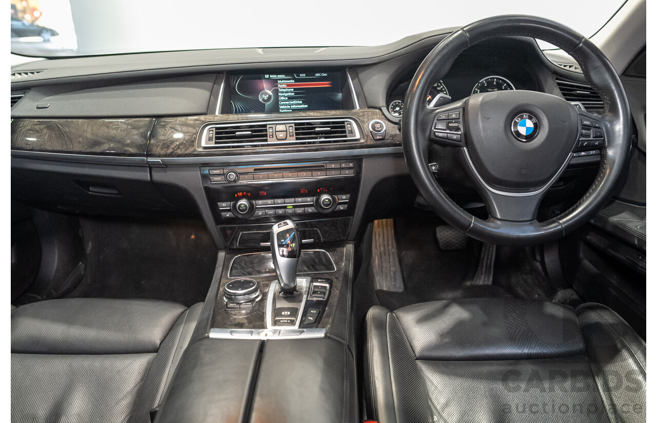 09/2013 BMW 740i F01 MY14 4d Sedan Mineral White Metallic Turbo 3.0L