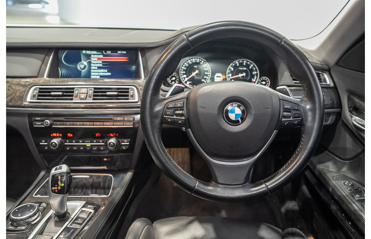 09/2013 BMW 740i F01 MY14 4d Sedan Mineral White Metallic Turbo 3.0L