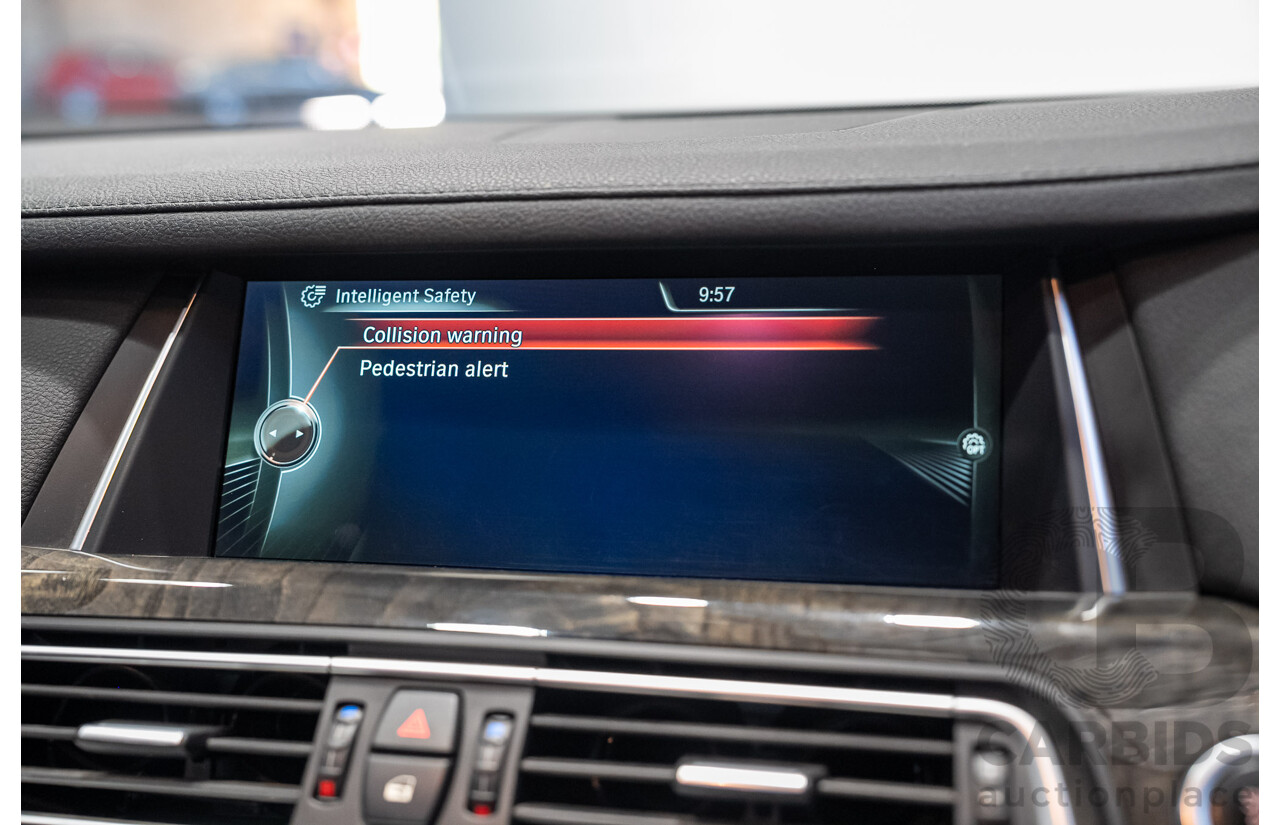 09/2013 BMW 740i F01 MY14 4d Sedan Mineral White Metallic Turbo 3.0L