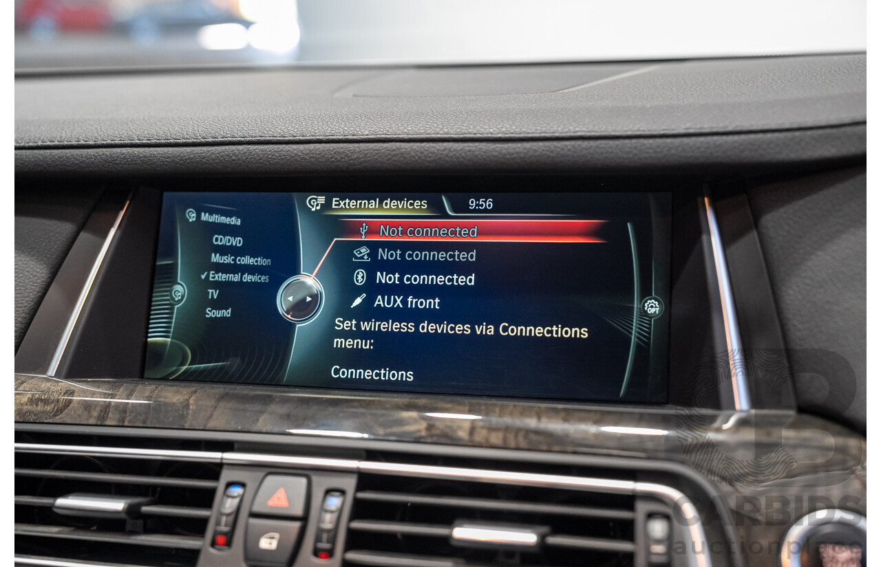 09/2013 BMW 740i F01 MY14 4d Sedan Mineral White Metallic Turbo 3.0L