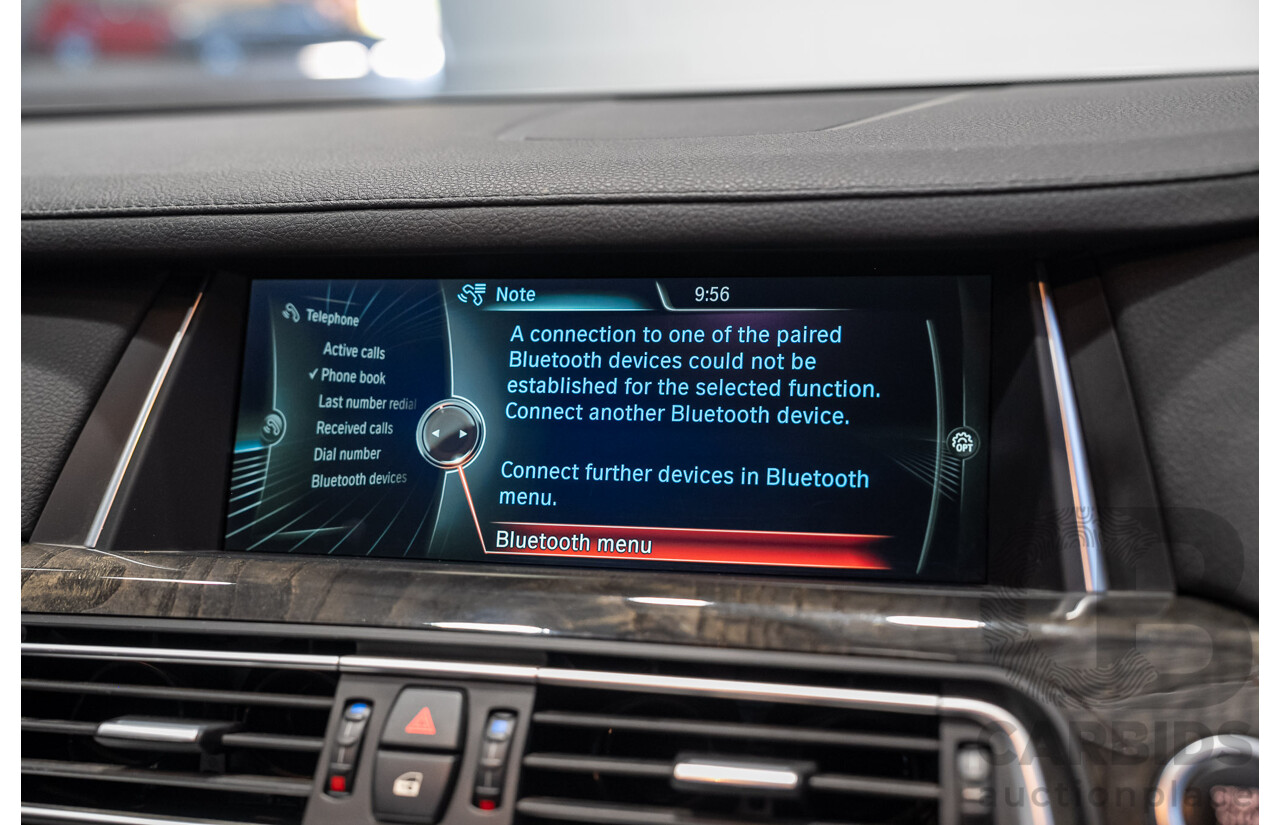 09/2013 BMW 740i F01 MY14 4d Sedan Mineral White Metallic Turbo 3.0L