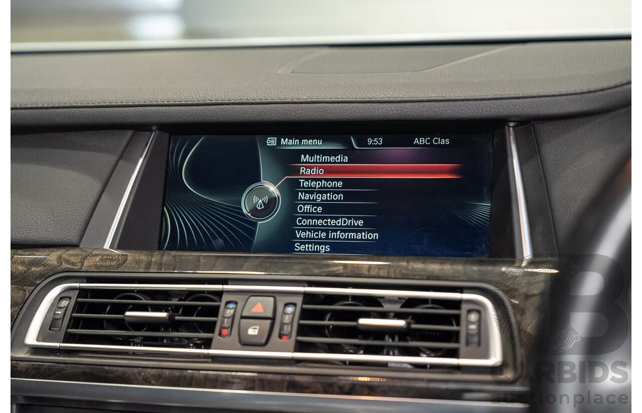 09/2013 BMW 740i F01 MY14 4d Sedan Mineral White Metallic Turbo 3.0L