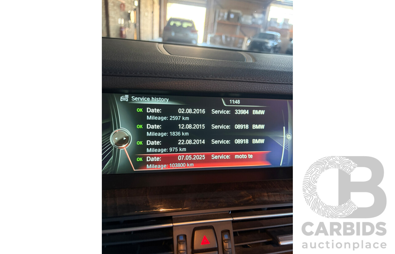 09/2013 BMW 740i F01 MY14 4d Sedan Mineral White Metallic Turbo 3.0L