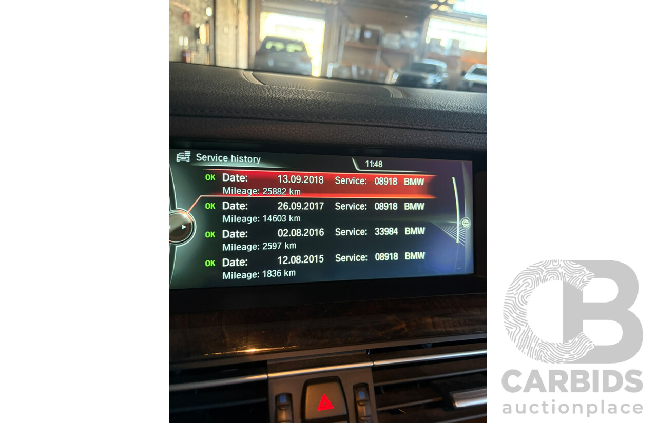 09/2013 BMW 740i F01 MY14 4d Sedan Mineral White Metallic Turbo 3.0L