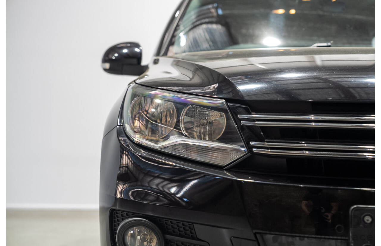 08/2012 Volkswagen Tiguan 132 TSI (AWD) 5NC MY12 4d Wagon Black Turbo 2.0L