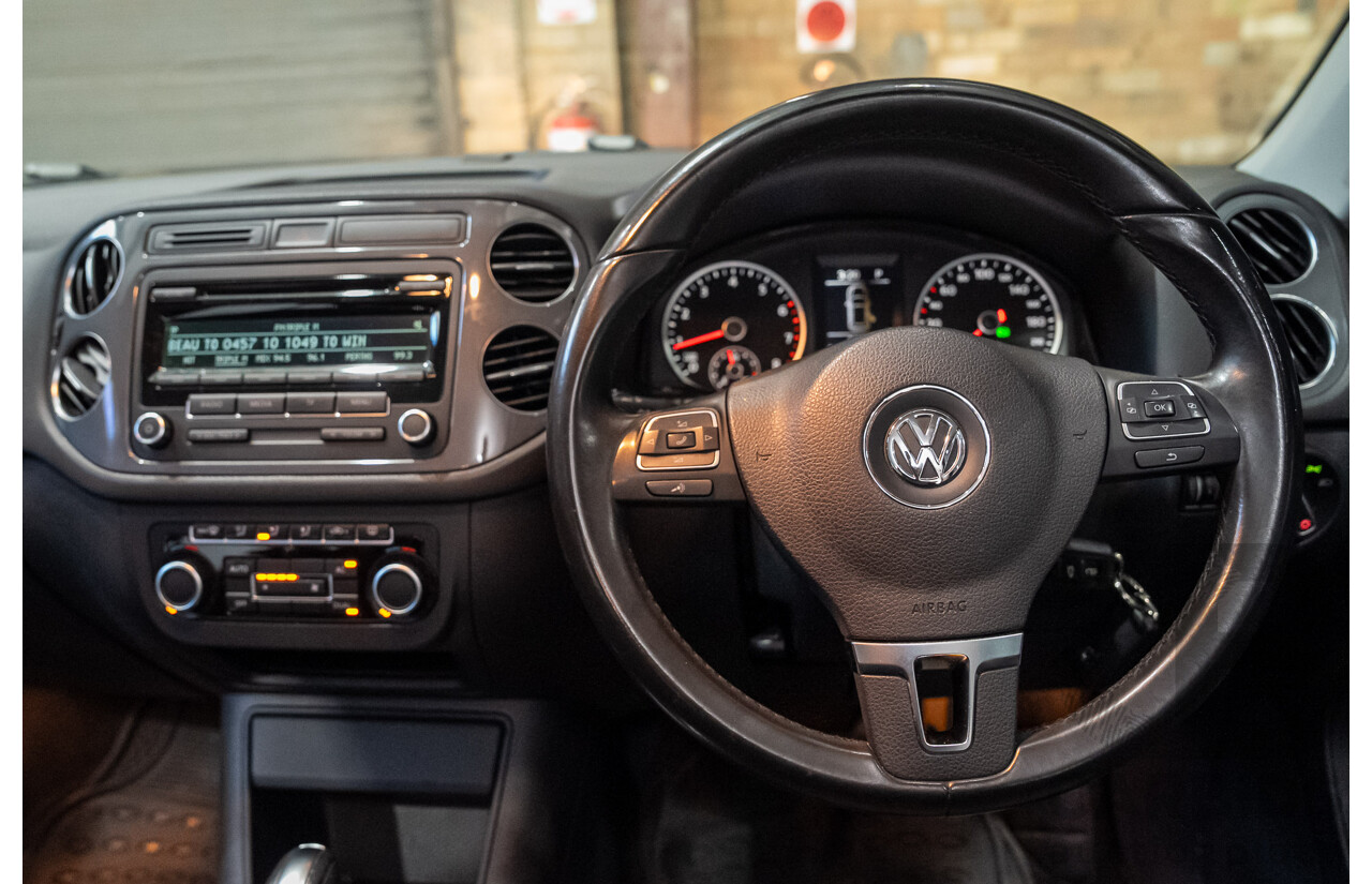08/2012 Volkswagen Tiguan 132 TSI (AWD) 5NC MY12 4d Wagon Black Turbo 2.0L