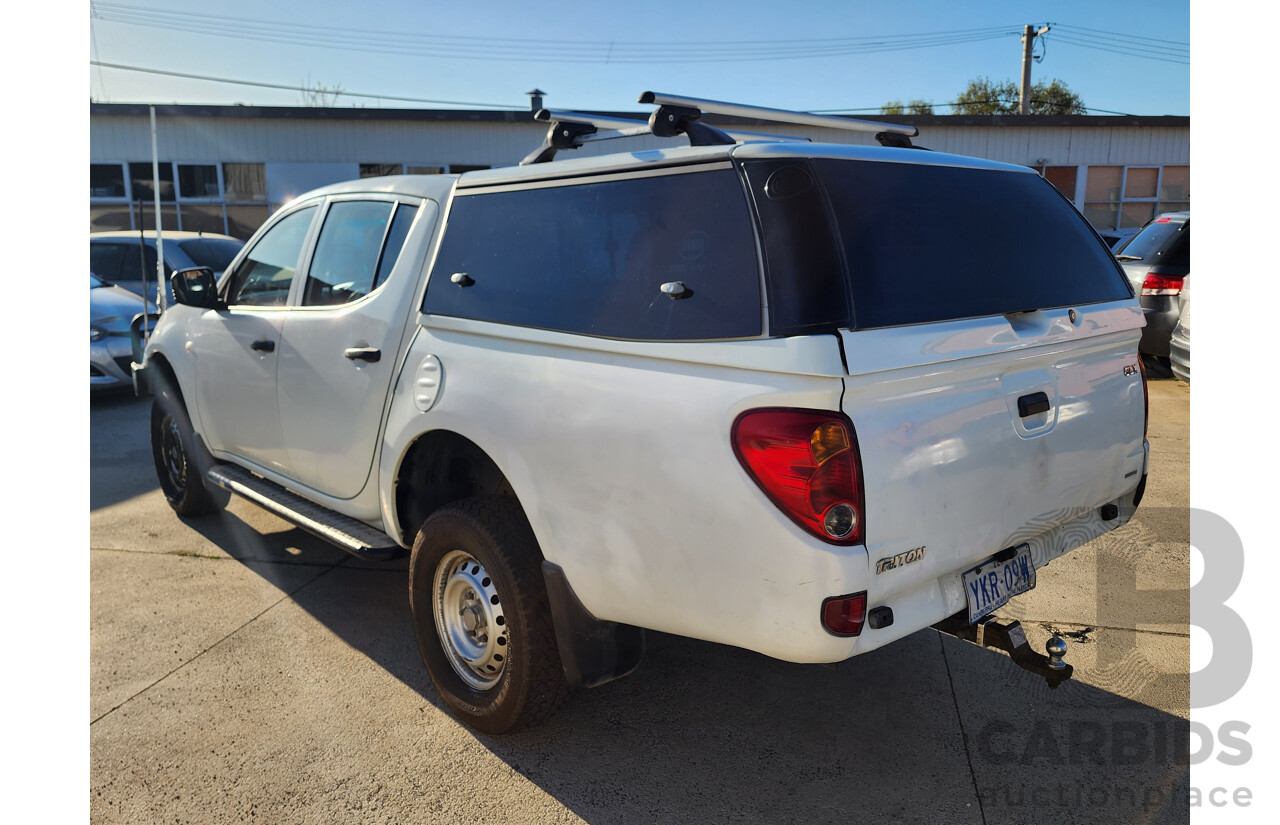 09/2009 Mitsubishi Triton GLX (4x4) ML MY09 Double Cab Utility White 3.2L