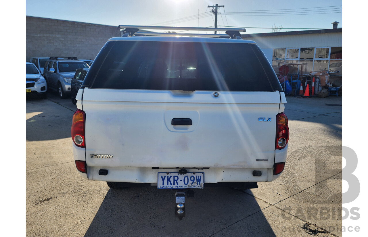 09/2009 Mitsubishi Triton GLX (4x4) ML MY09 Double Cab Utility White 3.2L