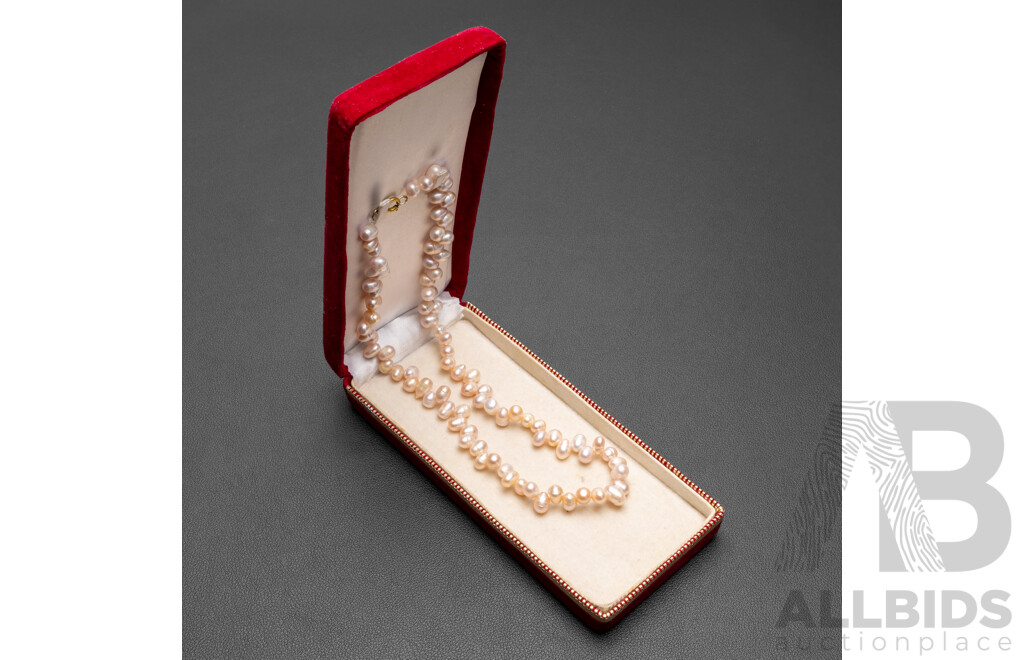 Strand of Cultured Pink Freshwater Pearl Necklace. Length - 49cms