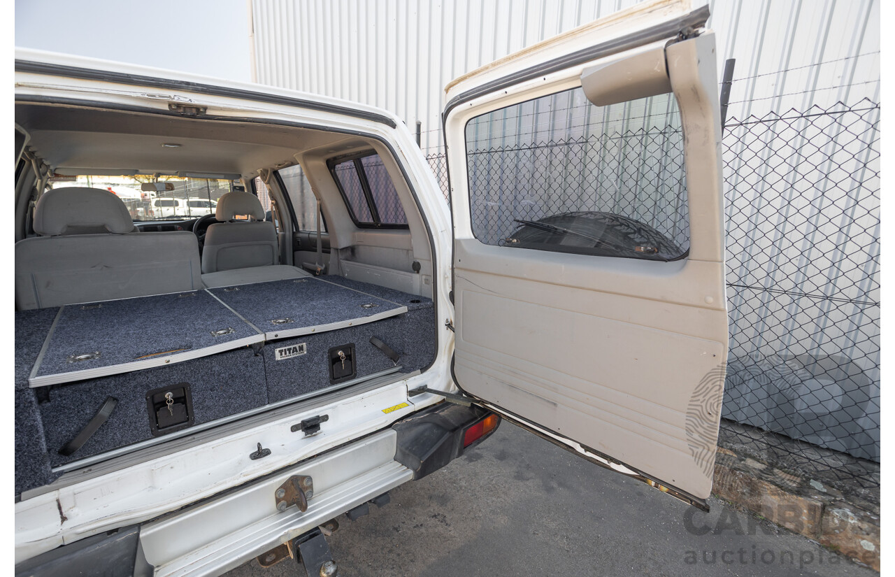 01/2004 Nissan Patrol DX (4x4) GU III 4D Wagon White Turbo Diesel 3.0L