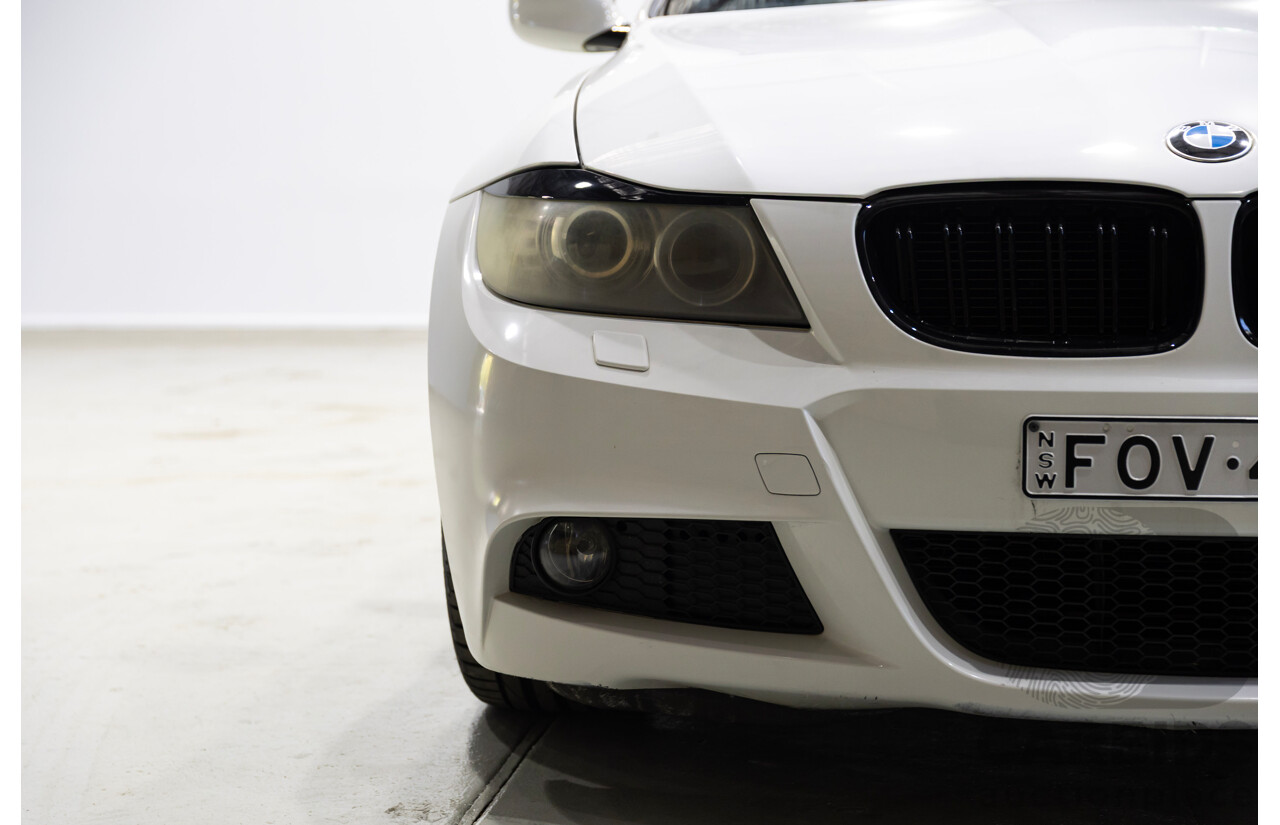 01/2011 BMW 320i Lifestyle E90 MY11 4d Sedan Alpine White 2.0L