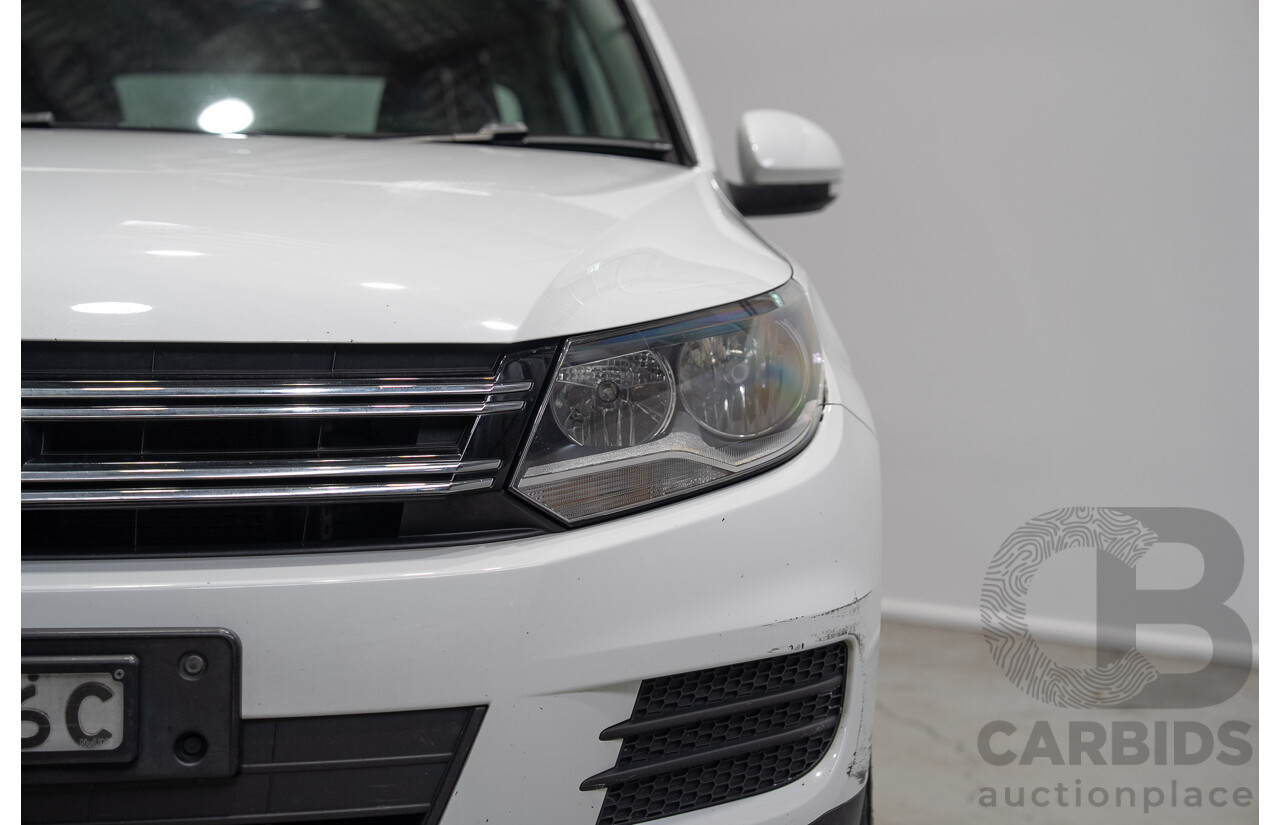 04/2015 Volkswagen Tiguan 118 TSI 5NC MY15 4d Wagon White Turbo Supercharged 1.4L