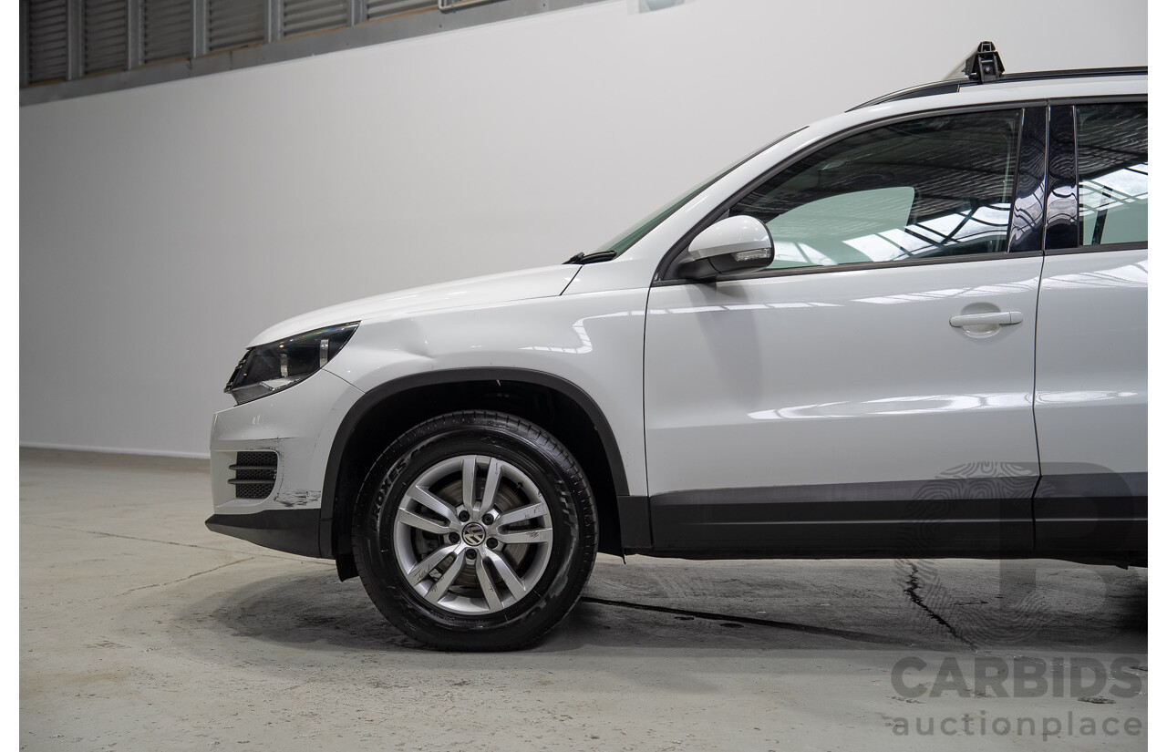 04/2015 Volkswagen Tiguan 118 TSI 5NC MY15 4d Wagon White Turbo Supercharged 1.4L