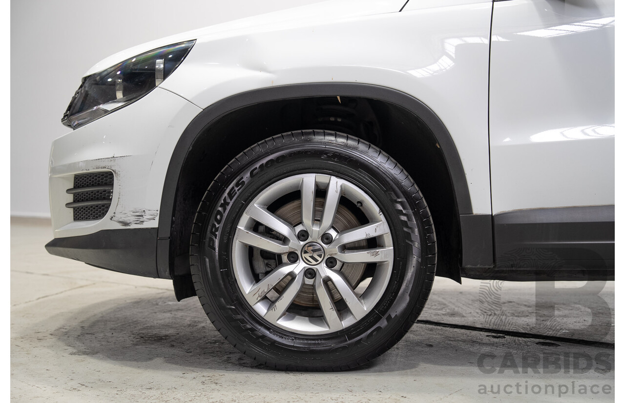 04/2015 Volkswagen Tiguan 118 TSI 5NC MY15 4d Wagon White Turbo Supercharged 1.4L