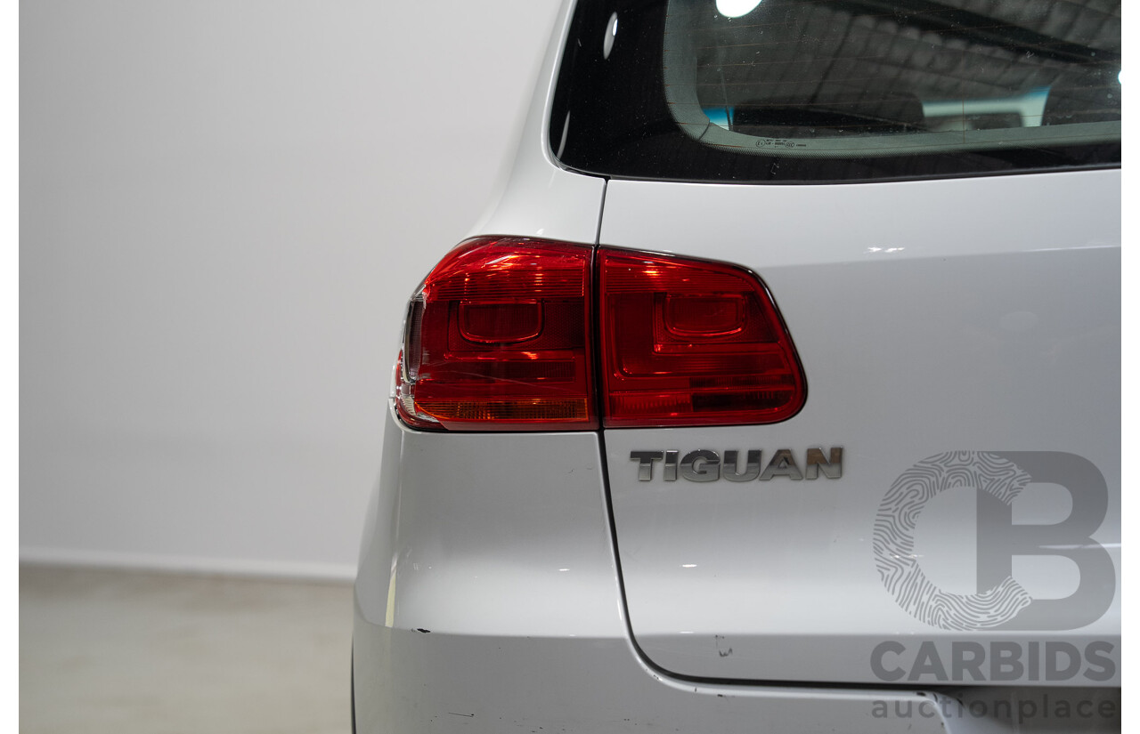 04/2015 Volkswagen Tiguan 118 TSI 5NC MY15 4d Wagon White Turbo Supercharged 1.4L