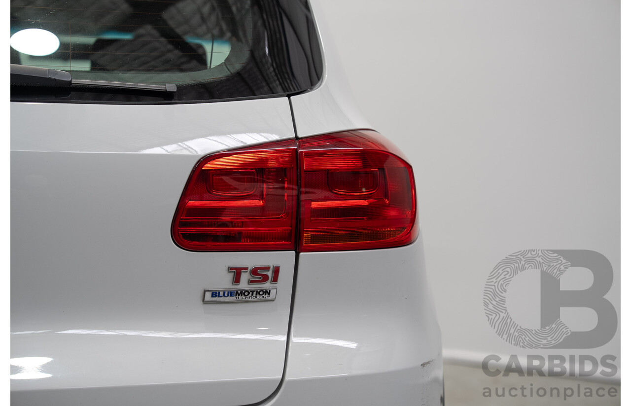 04/2015 Volkswagen Tiguan 118 TSI 5NC MY15 4d Wagon White Turbo Supercharged 1.4L