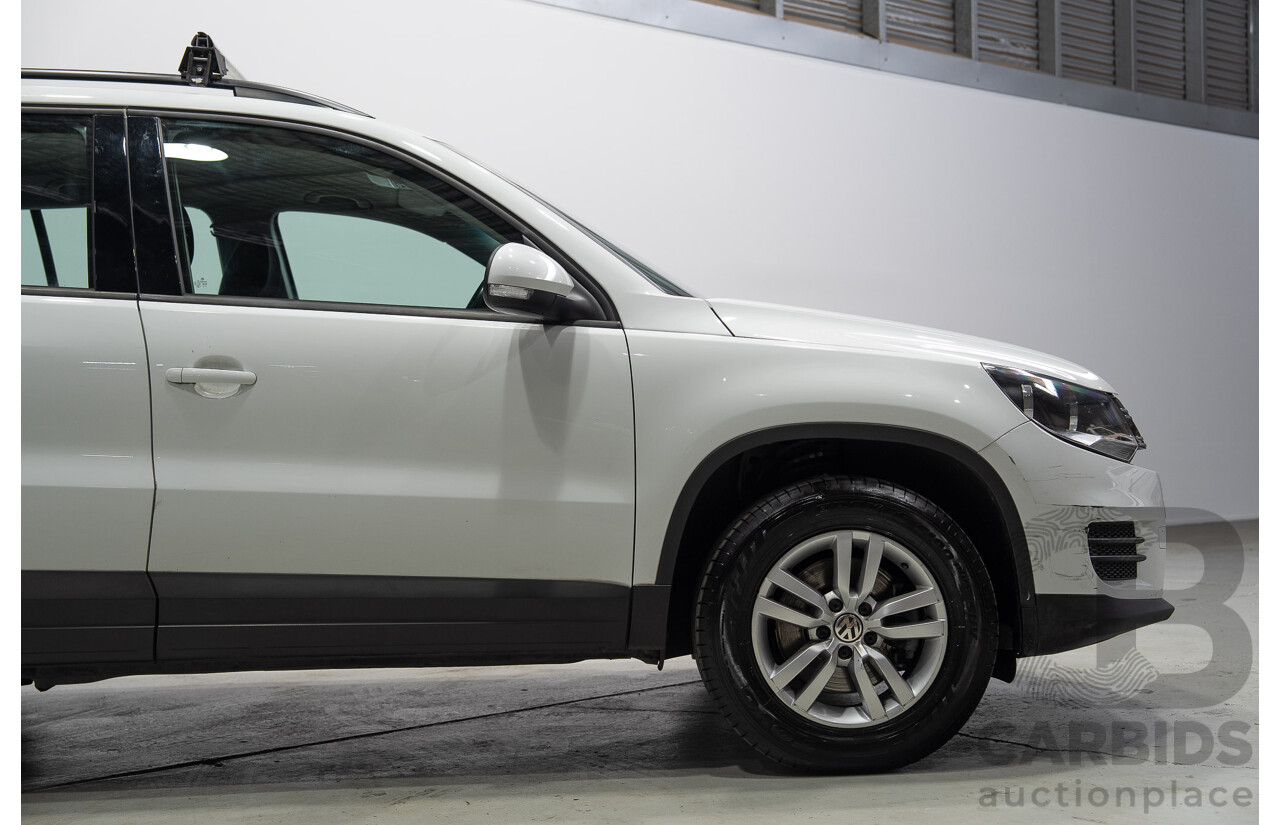 04/2015 Volkswagen Tiguan 118 TSI 5NC MY15 4d Wagon White Turbo Supercharged 1.4L