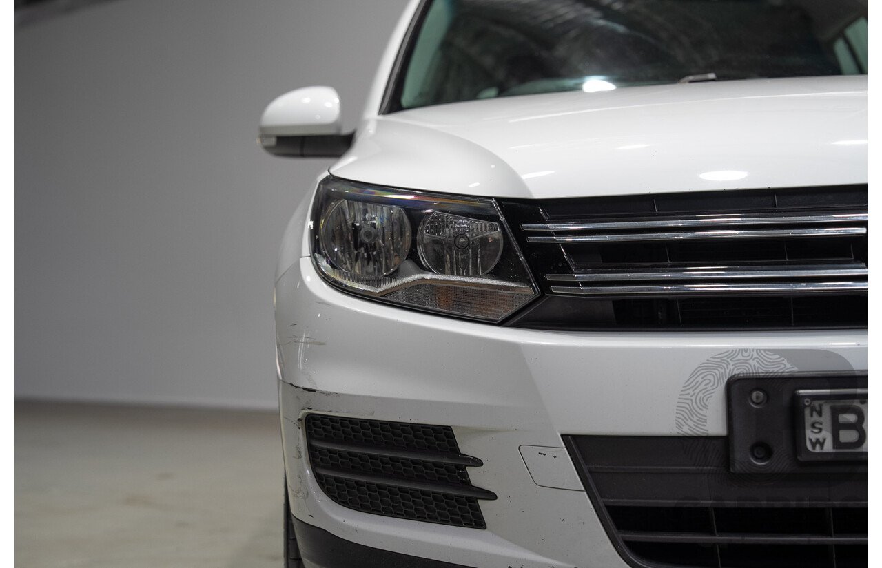 04/2015 Volkswagen Tiguan 118 TSI 5NC MY15 4d Wagon White Turbo Supercharged 1.4L
