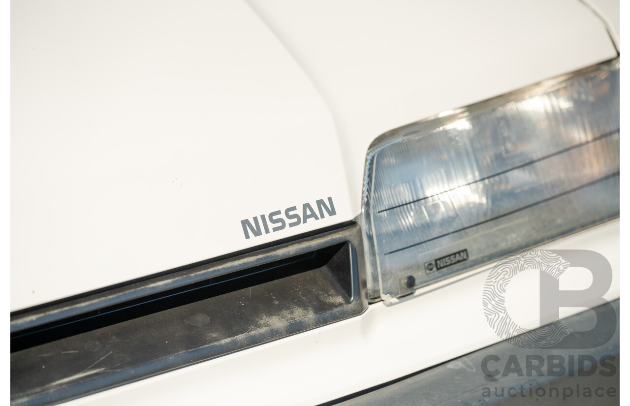 5/1990 Nissan Skyline GXE R31 4d Sedan White 3.0L