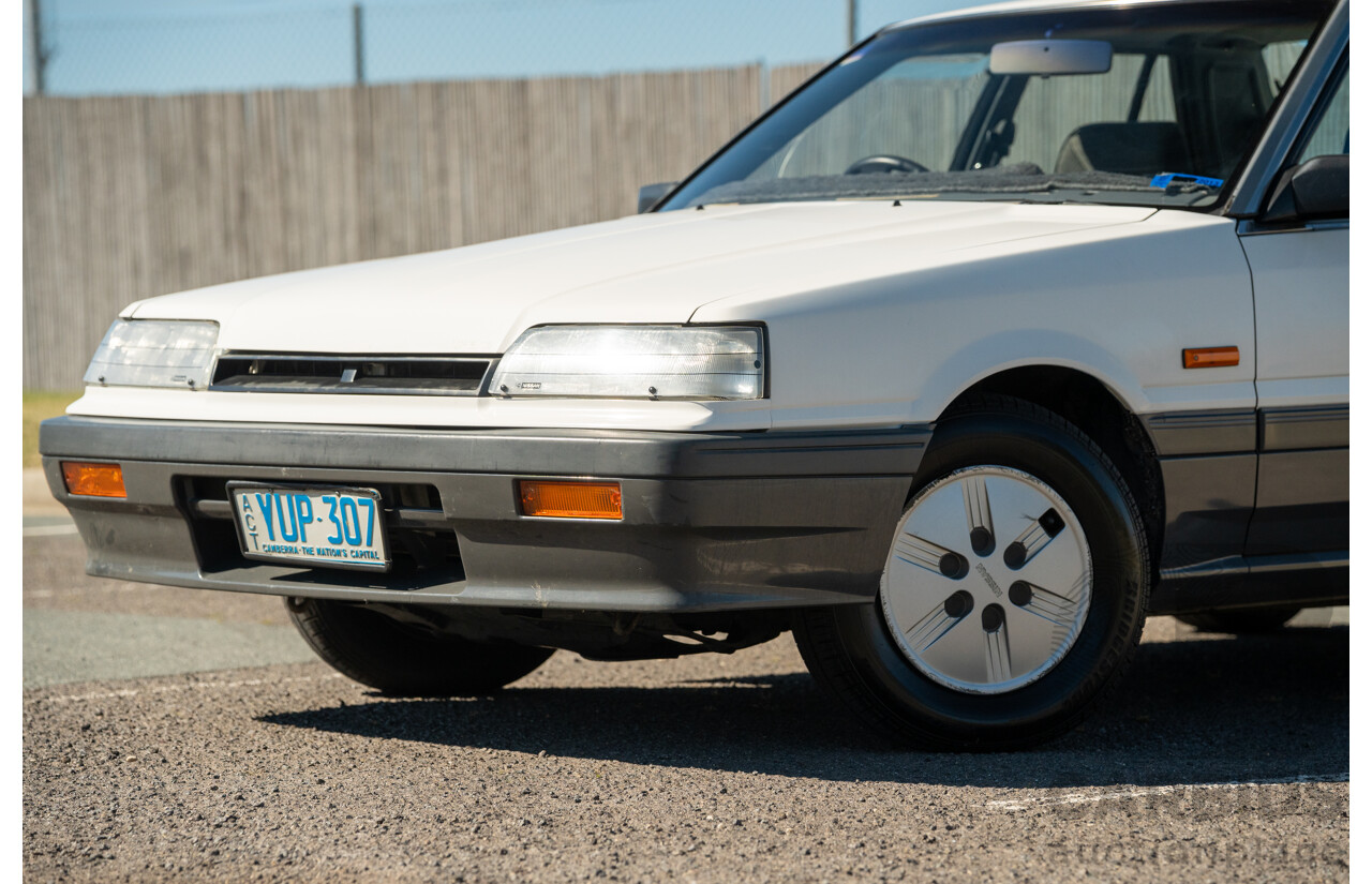 5/1990 Nissan Skyline GXE R31 4d Sedan White 3.0L