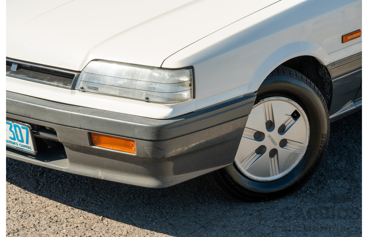 5/1990 Nissan Skyline GXE R31 4d Sedan White 3.0L