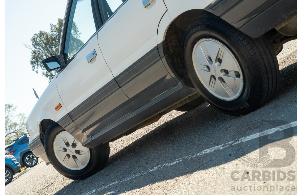 5/1990 Nissan Skyline GXE R31 4d Sedan White 3.0L