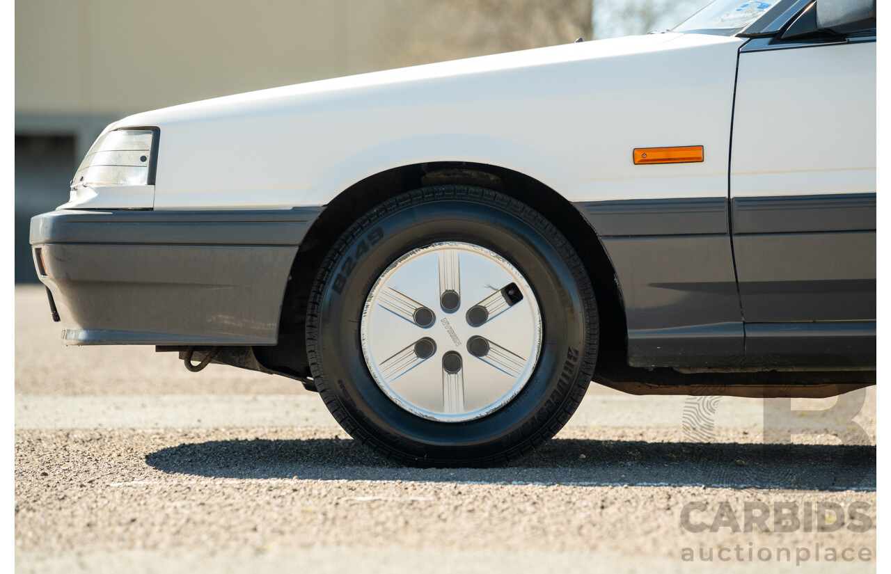 5/1990 Nissan Skyline GXE R31 4d Sedan White 3.0L