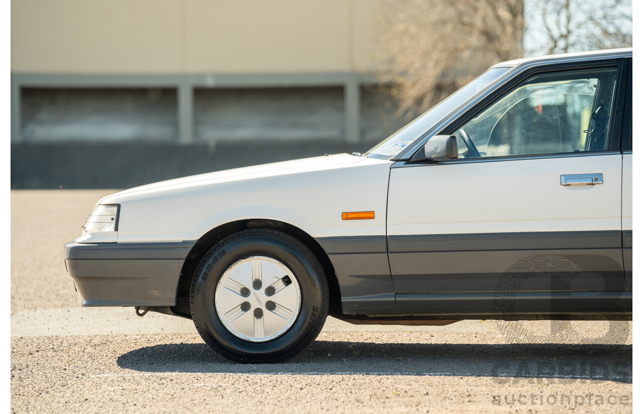 5/1990 Nissan Skyline GXE R31 4d Sedan White 3.0L
