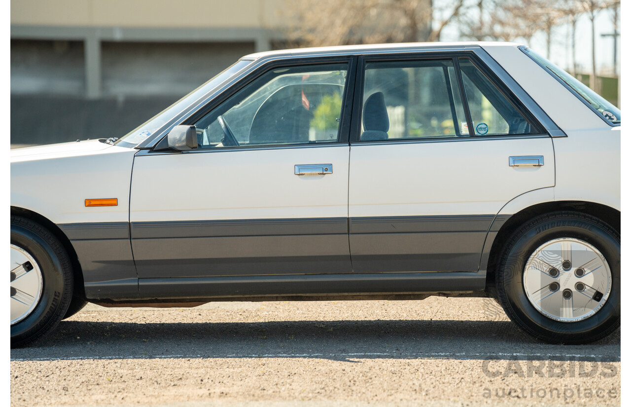 5/1990 Nissan Skyline GXE R31 4d Sedan White 3.0L