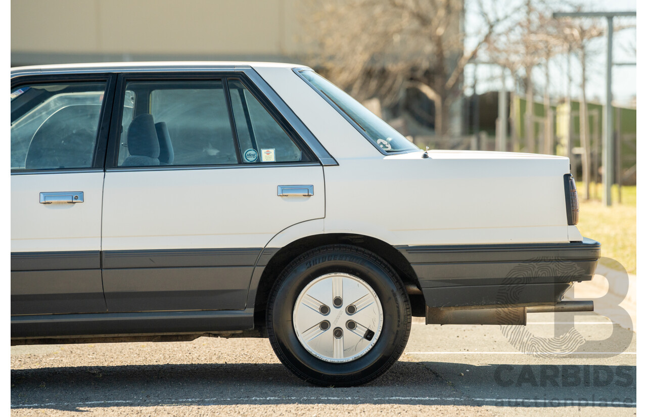 5/1990 Nissan Skyline GXE R31 4d Sedan White 3.0L