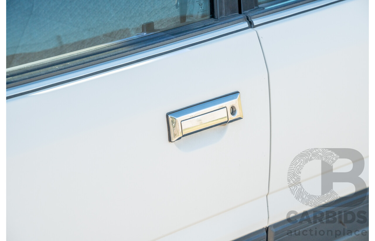 5/1990 Nissan Skyline GXE R31 4d Sedan White 3.0L