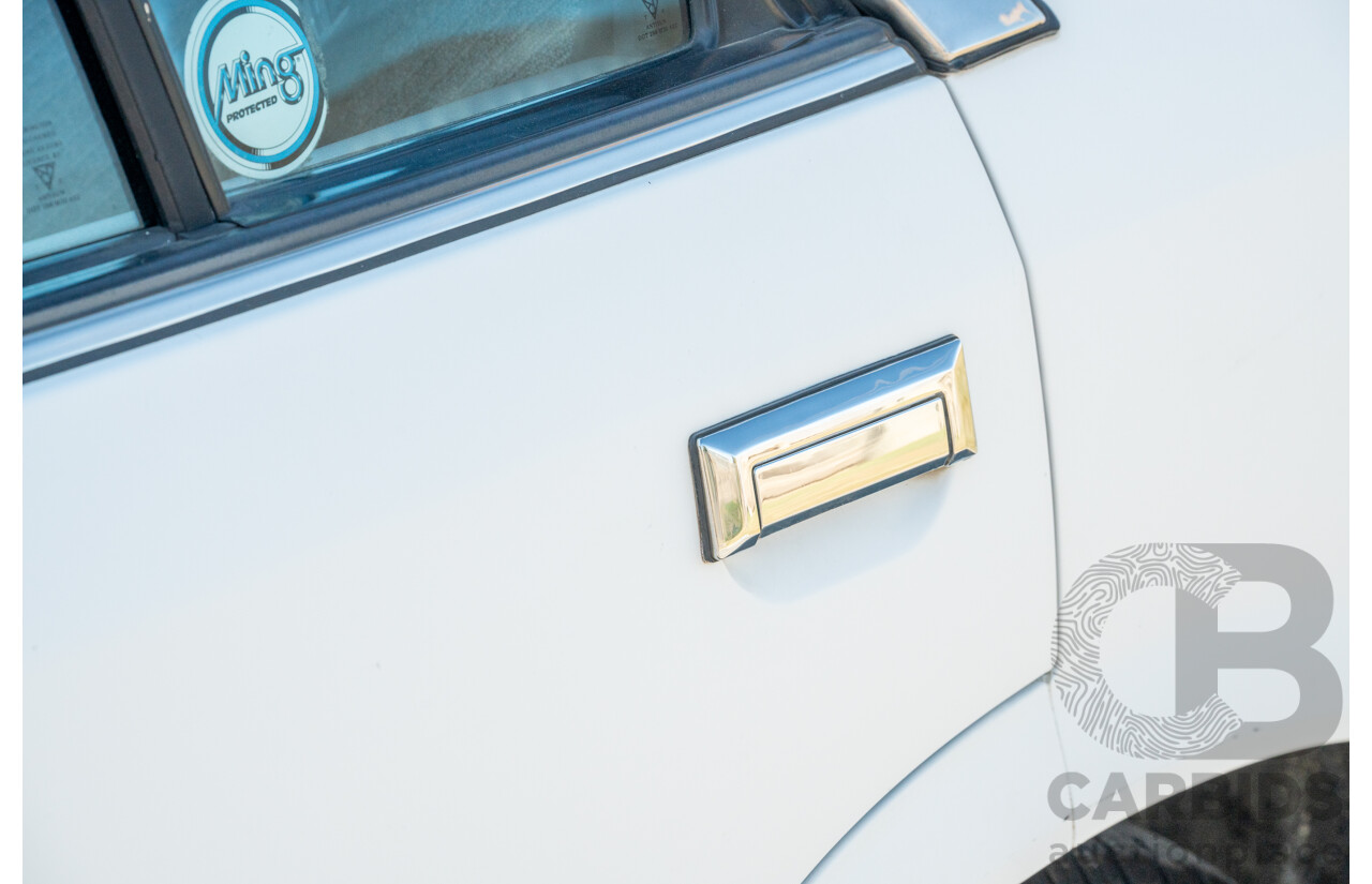 5/1990 Nissan Skyline GXE R31 4d Sedan White 3.0L