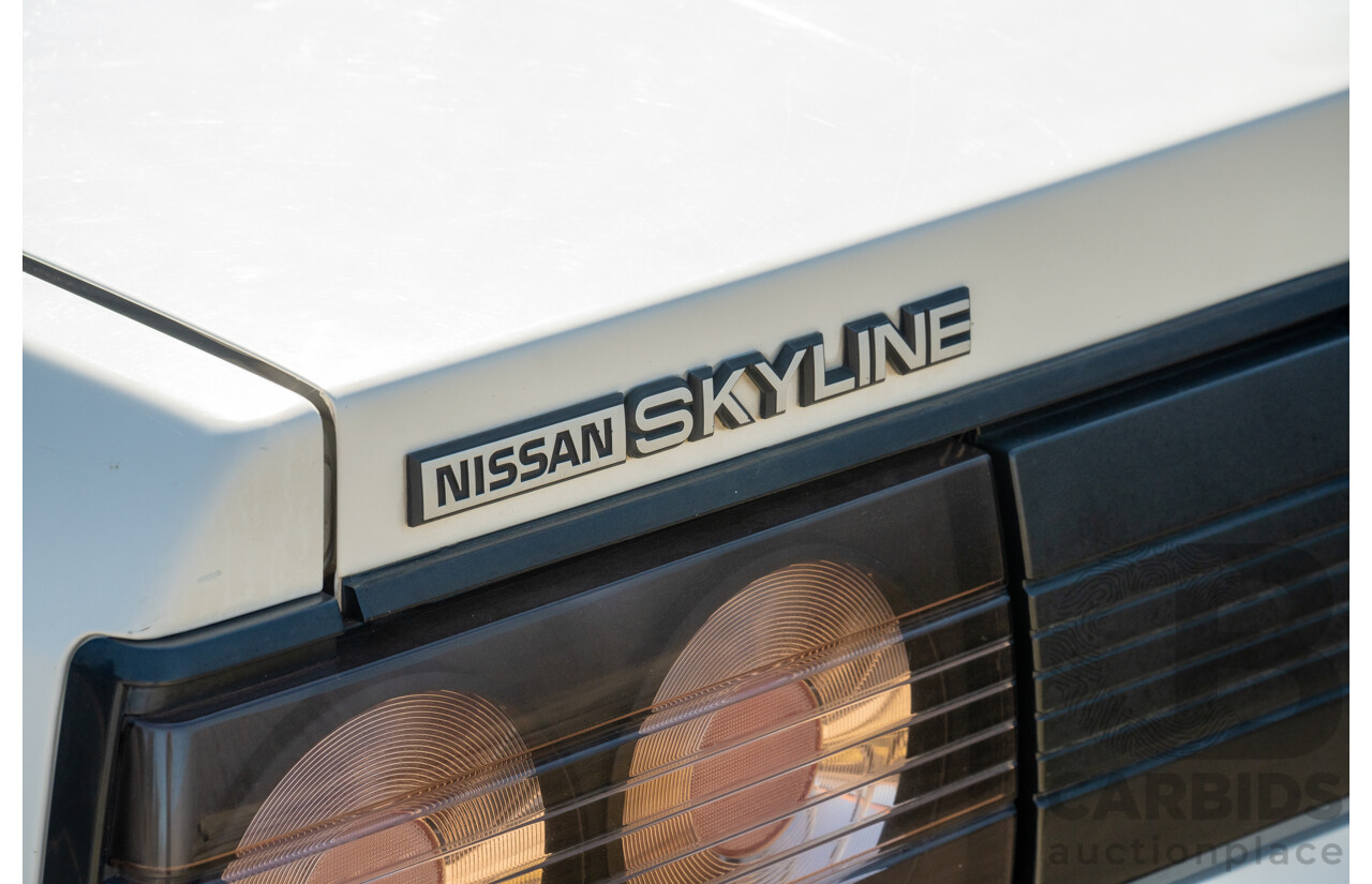 5/1990 Nissan Skyline GXE R31 4d Sedan White 3.0L