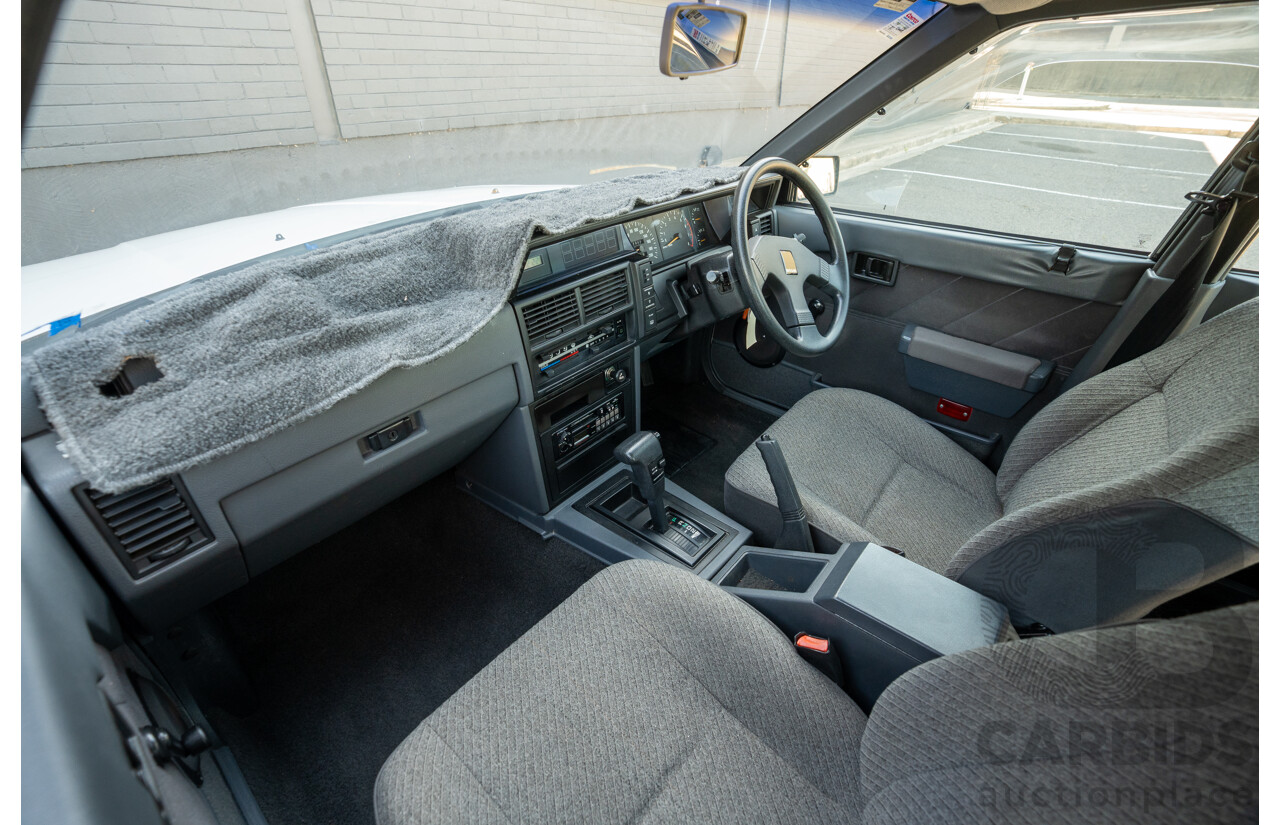 5/1990 Nissan Skyline GXE R31 4d Sedan White 3.0L