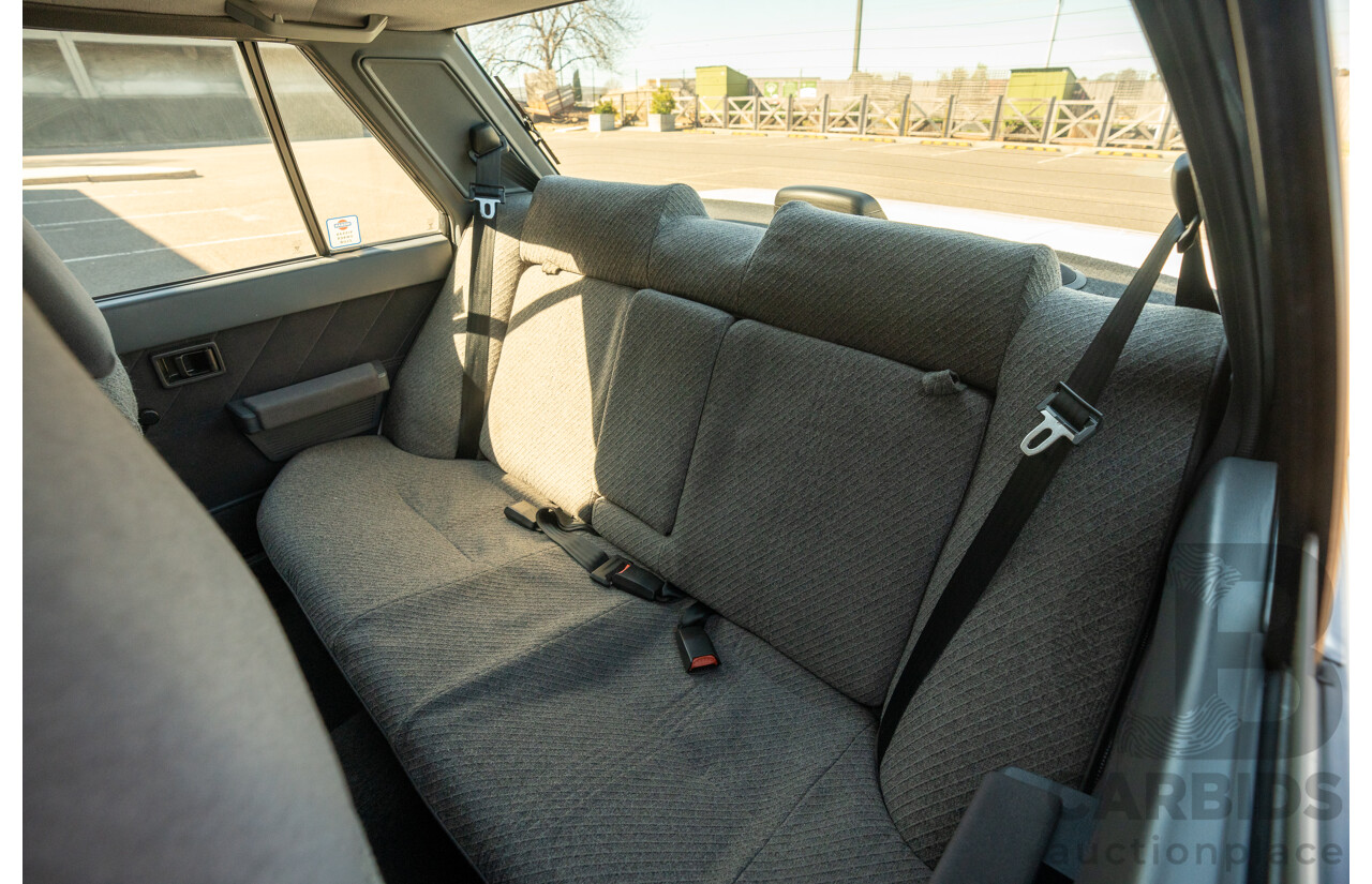 5/1990 Nissan Skyline GXE R31 4d Sedan White 3.0L