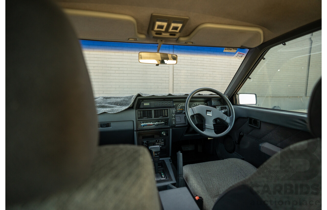5/1990 Nissan Skyline GXE R31 4d Sedan White 3.0L