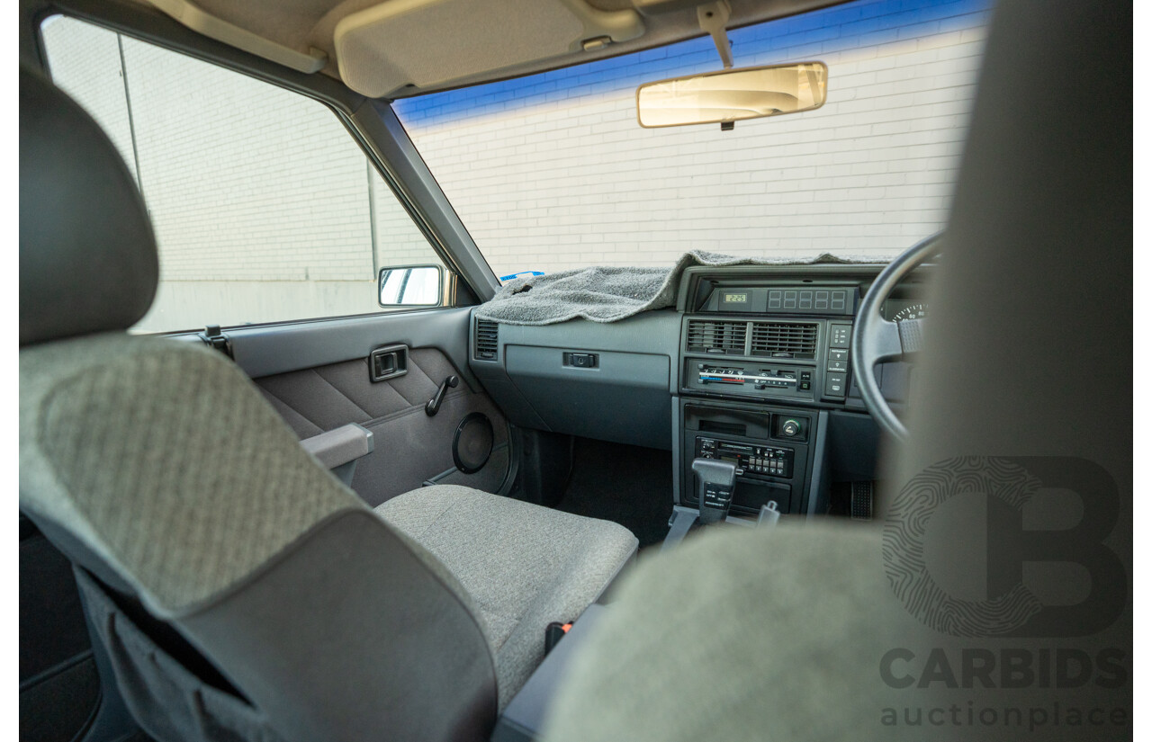 5/1990 Nissan Skyline GXE R31 4d Sedan White 3.0L