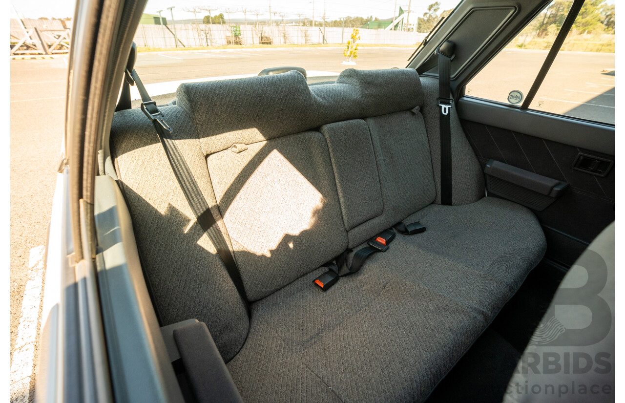 5/1990 Nissan Skyline GXE R31 4d Sedan White 3.0L