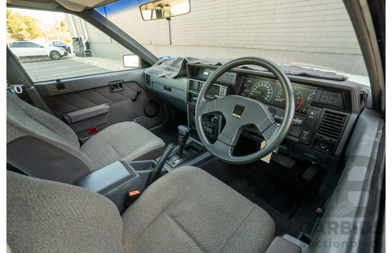 5/1990 Nissan Skyline GXE R31 4d Sedan White 3.0L